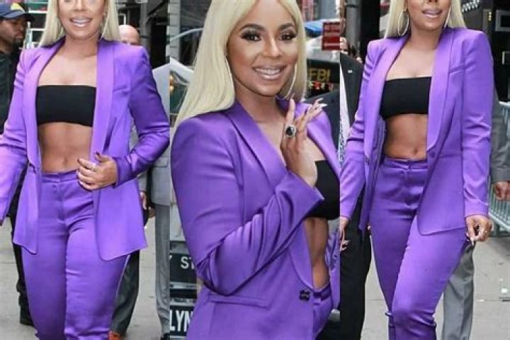 Ashanti Gives Beyoncé A Run For Her Money In Viral Video As She Puts Her Curves On Full Display In Purple Bathing Suit