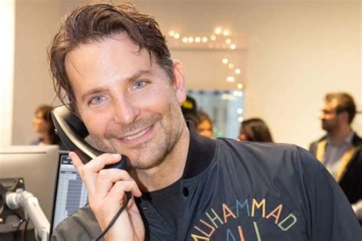Bradley Cooper Answers Telephones At ICAP Charity Day