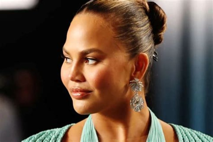 Chrissy Teigen Drags GAP Over Half Blue, Half Red Hoodie Celebrating ‘Unity’ ‘Too Soon’ After The Election!