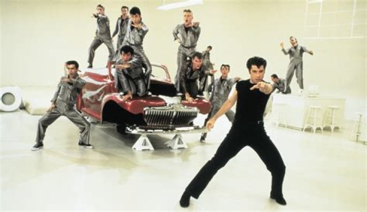 Did John Travolta sing in ‘Grease?’