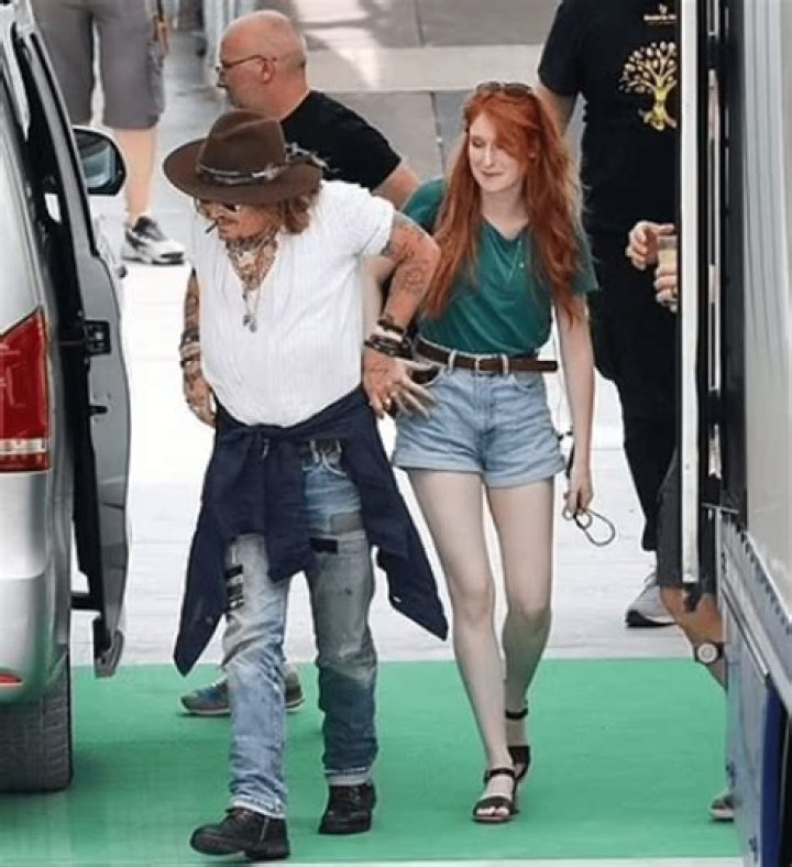 Johnny Depp Traveled To Italy With An Unknown Woman With Red Hair