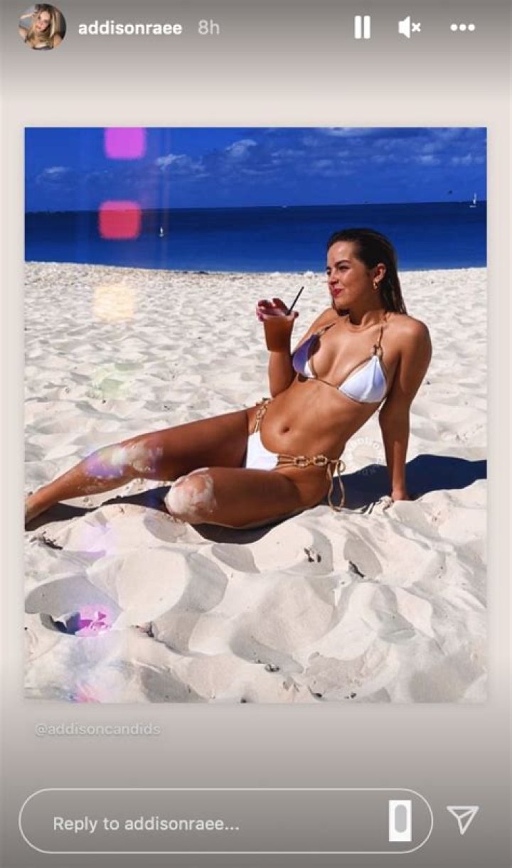 Addison Rae in Bathing Suit Sips Drink in the Sand — Celebwell