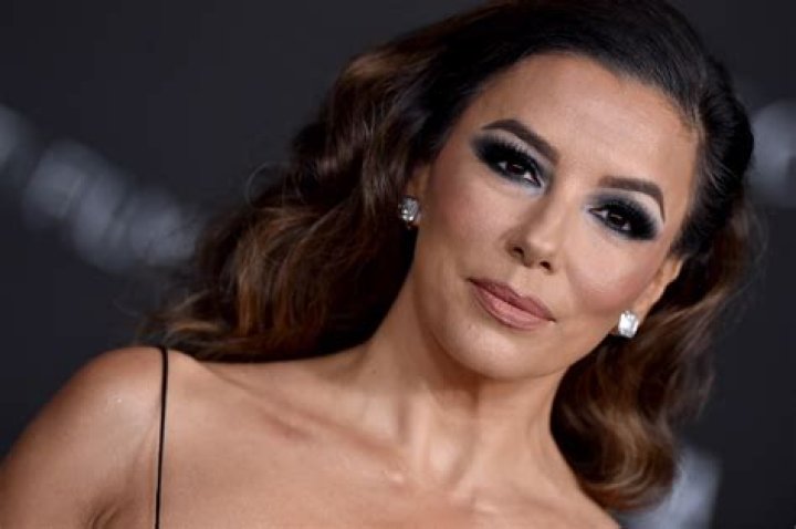 Eva Longoria in Bathing Suit Says "Don't Go Chasing Waterfalls" — Celebwell