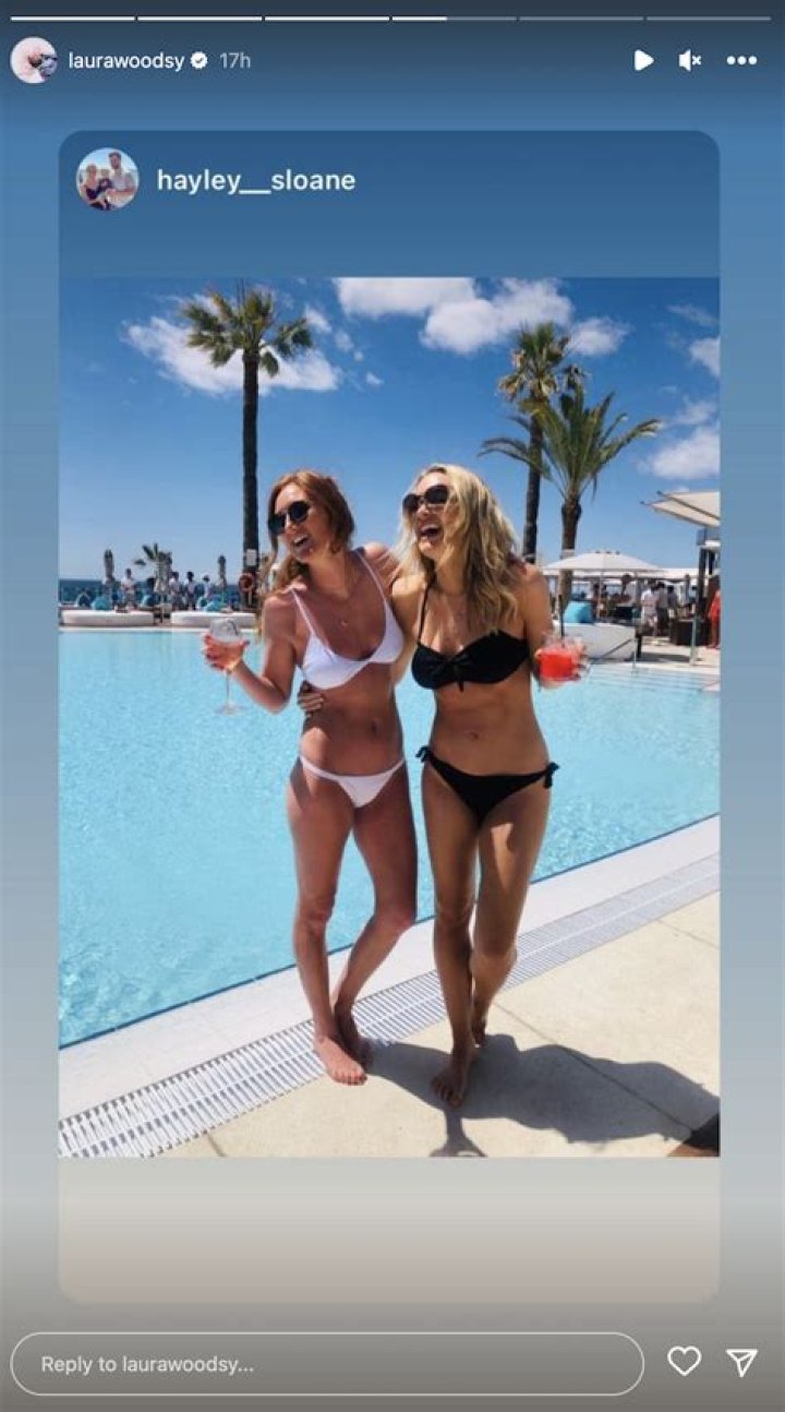 Laura Woods in Bathing Suit Laughs by the Pool — Celebwell
