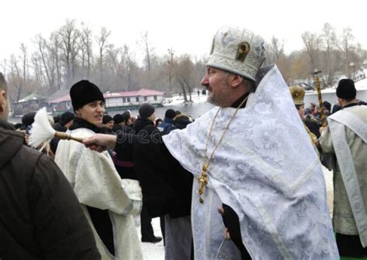 
Russian Priest, Mykhailo Vasylyuk, beats Ukraine Preist With Cross at Soldier’s Funeral 