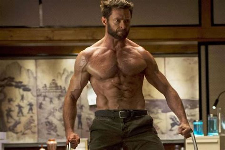 Ryan Reynolds Hilariously Inserts Himself Into Hugh Jackman’s Photo