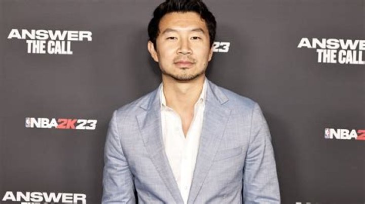 Simu Liu has fans thirsty in his new duds courtesy of Rihanna