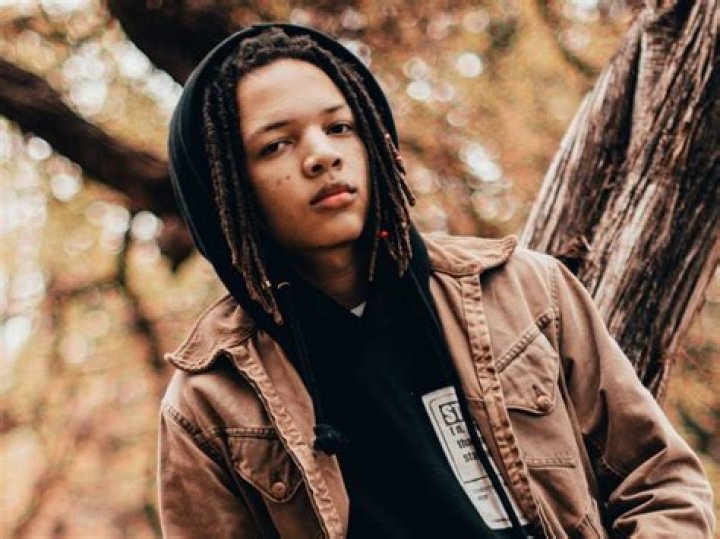 T.I.’s Son, Domani Harris Is Proudly Showing Off Uncle Vibes While Holding Zonnique Pullins’ Daughter