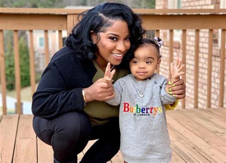 Toya Wright Posts Pictures Of Reginae Carter Kissing Baby Reign Rushing On The Lips — Fans Are Angry — “Do You Know Where Her Mouth Has Been?”