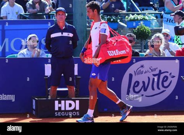 Who is Juan Pablo Varillas coach Diego Junqueira?
