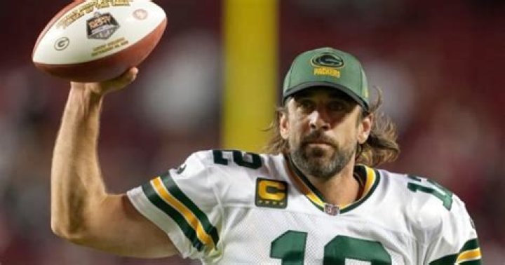 Why is Aaron Rodgers growing his hair long?