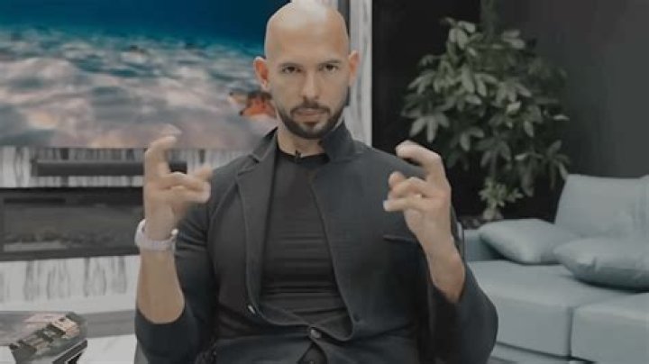 Why was Andrew Tate arrested for human trafficking?