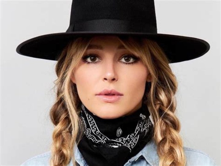 Yellowstone Star Hassie Harrison Shares Swimsuit Photo From "the Beach"